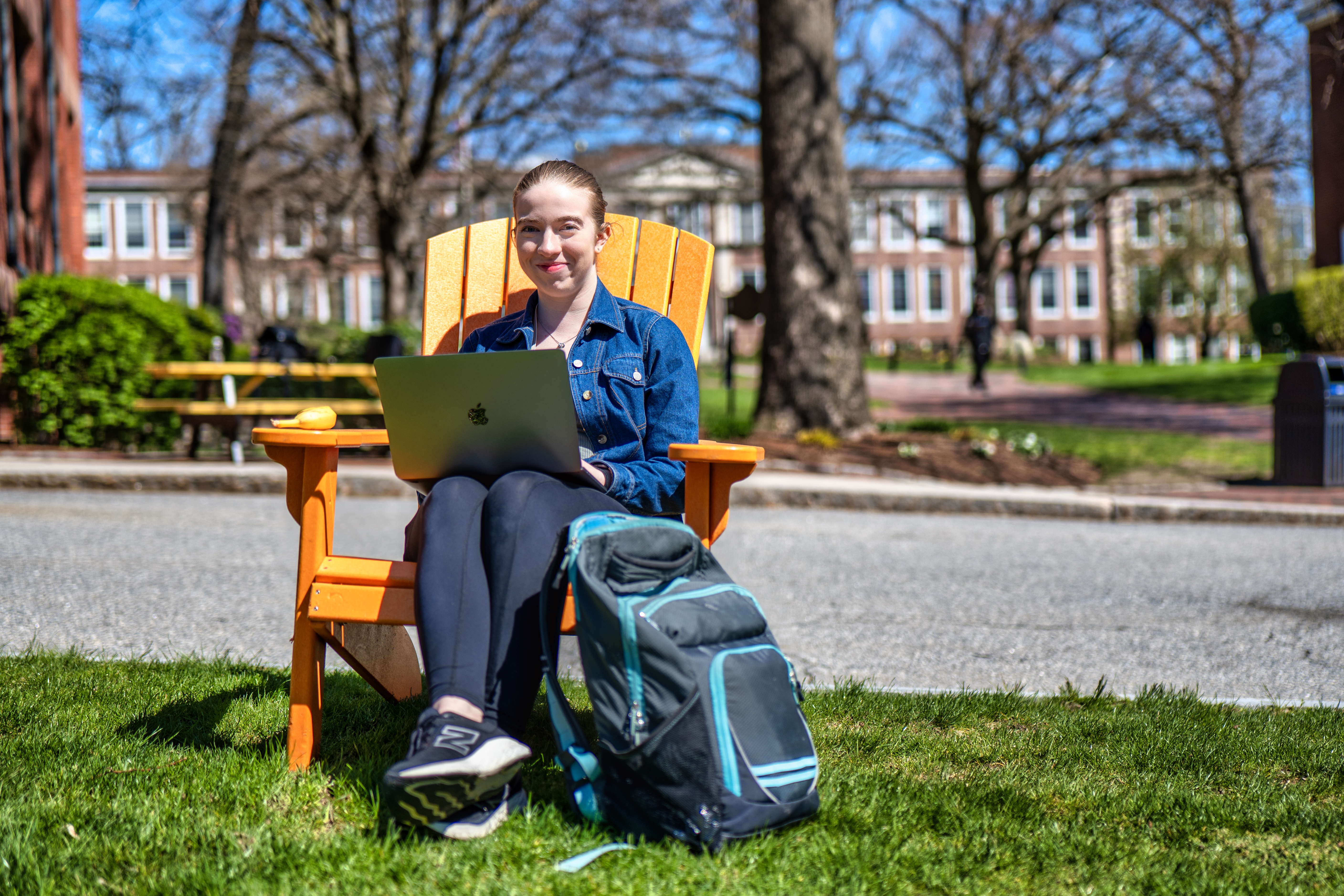 Student in lawn chair