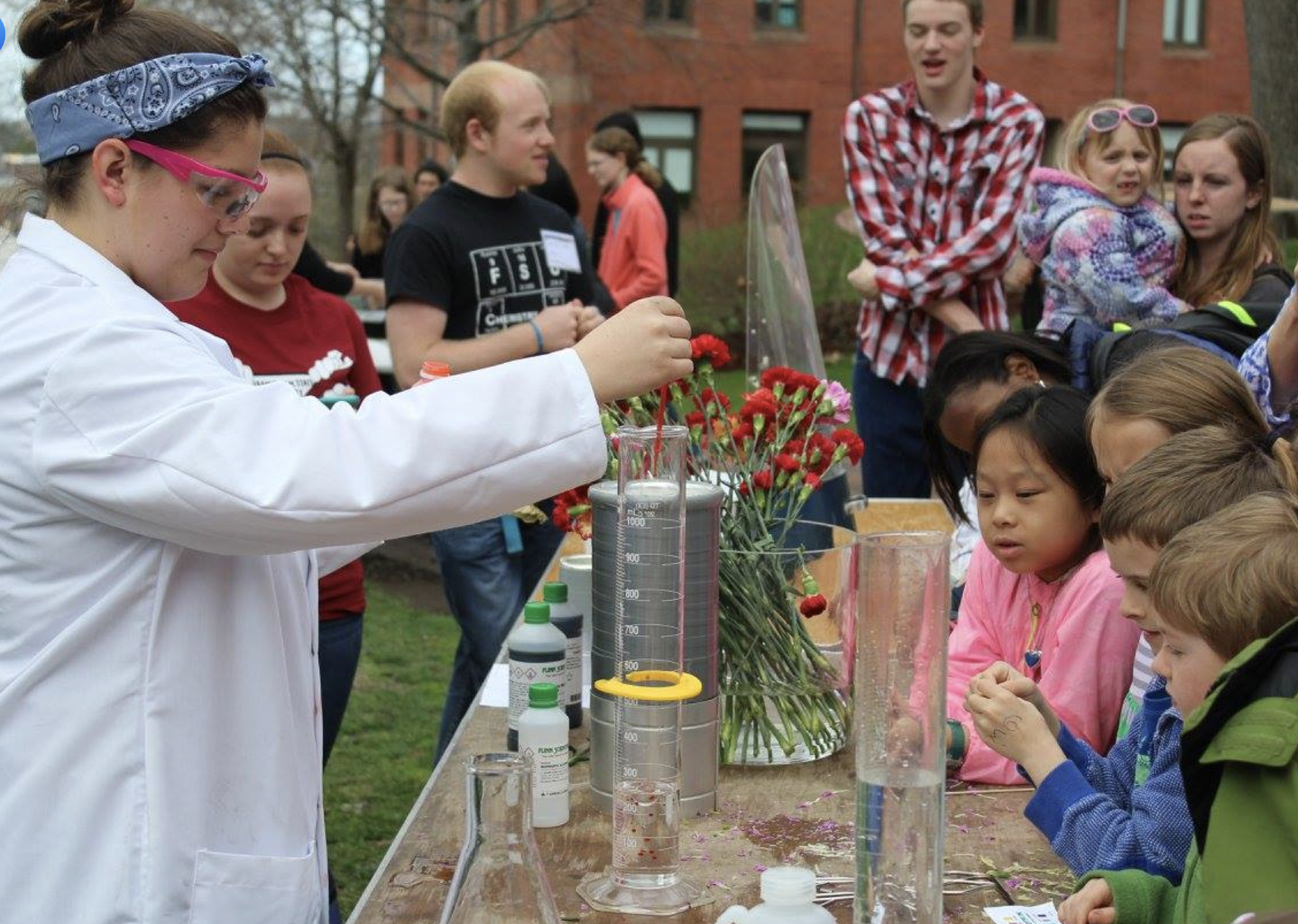 A scene from a previous Science on State Street showing kids watching a science presentation