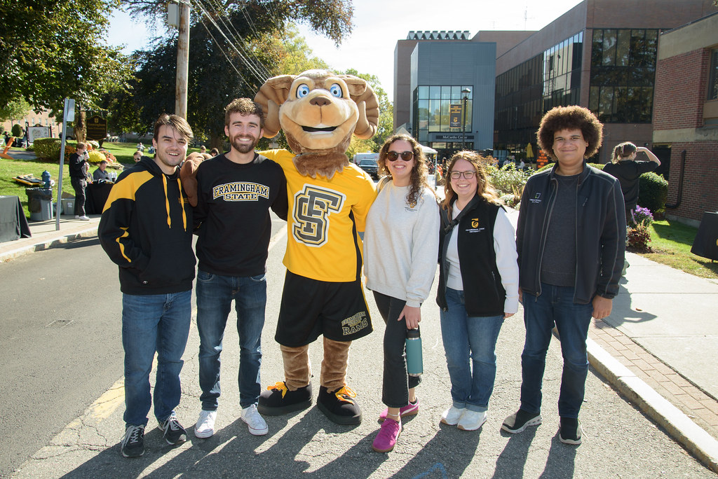 Students and staff with Sam the Ram on State Street