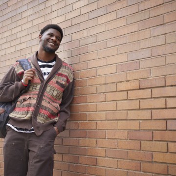 Student smiling with backpack