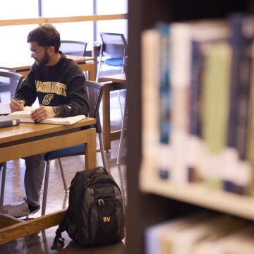 Student in library