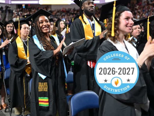 Students at commencement with College of Distinction logo superimposed over the image