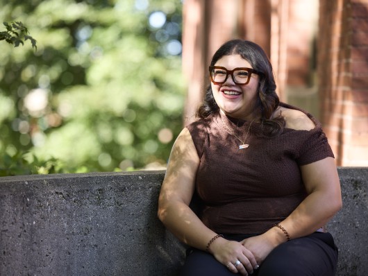 A student smiling on the FSU campus