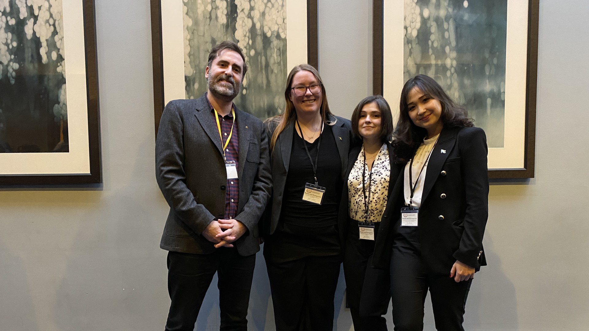 Political Science students and Professors at a conference 