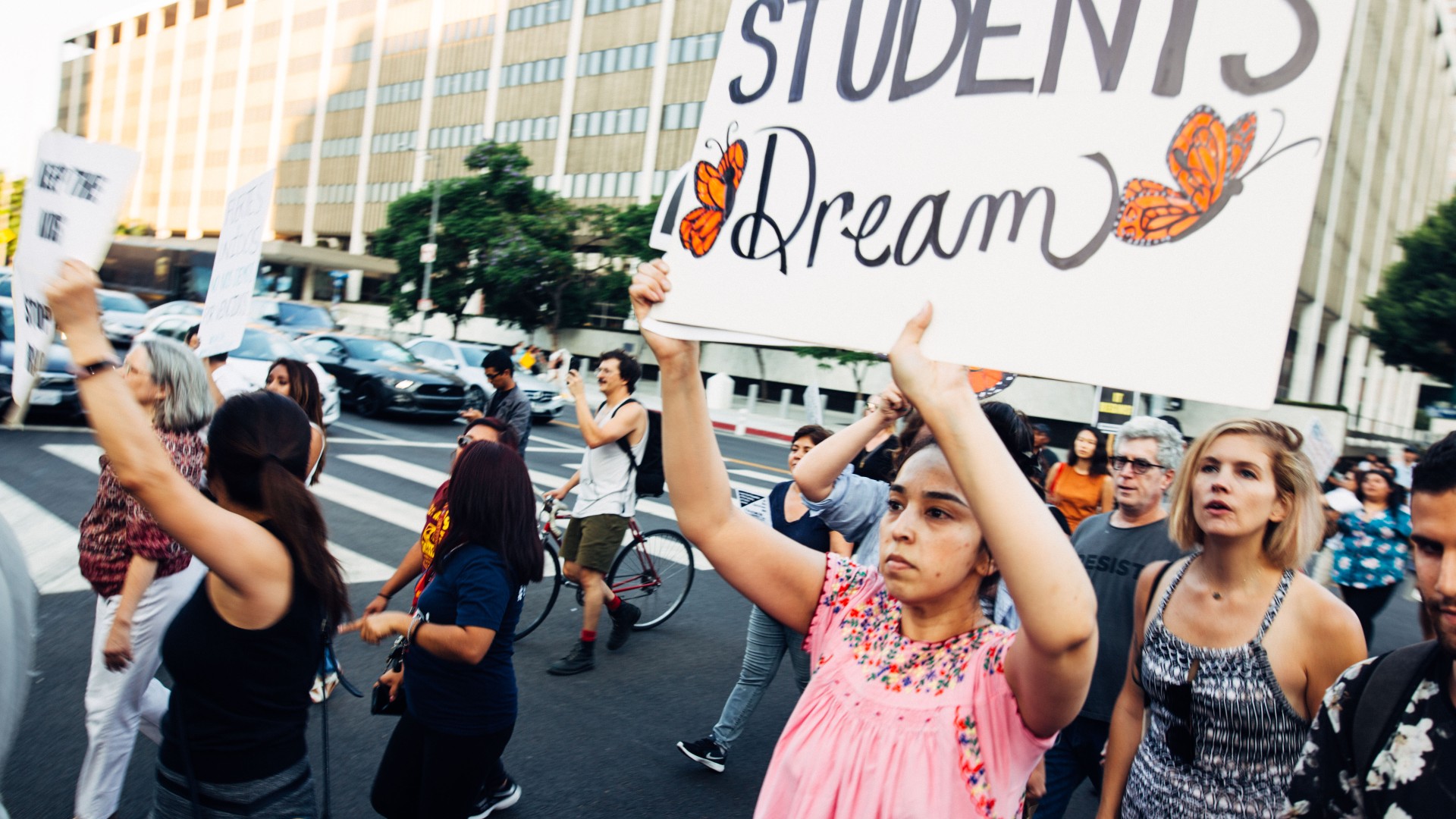 People marching in support of DACA students