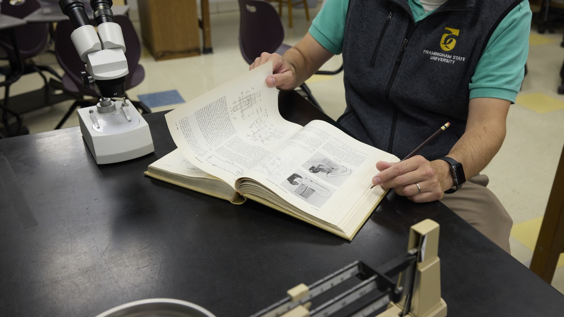 Student look through book