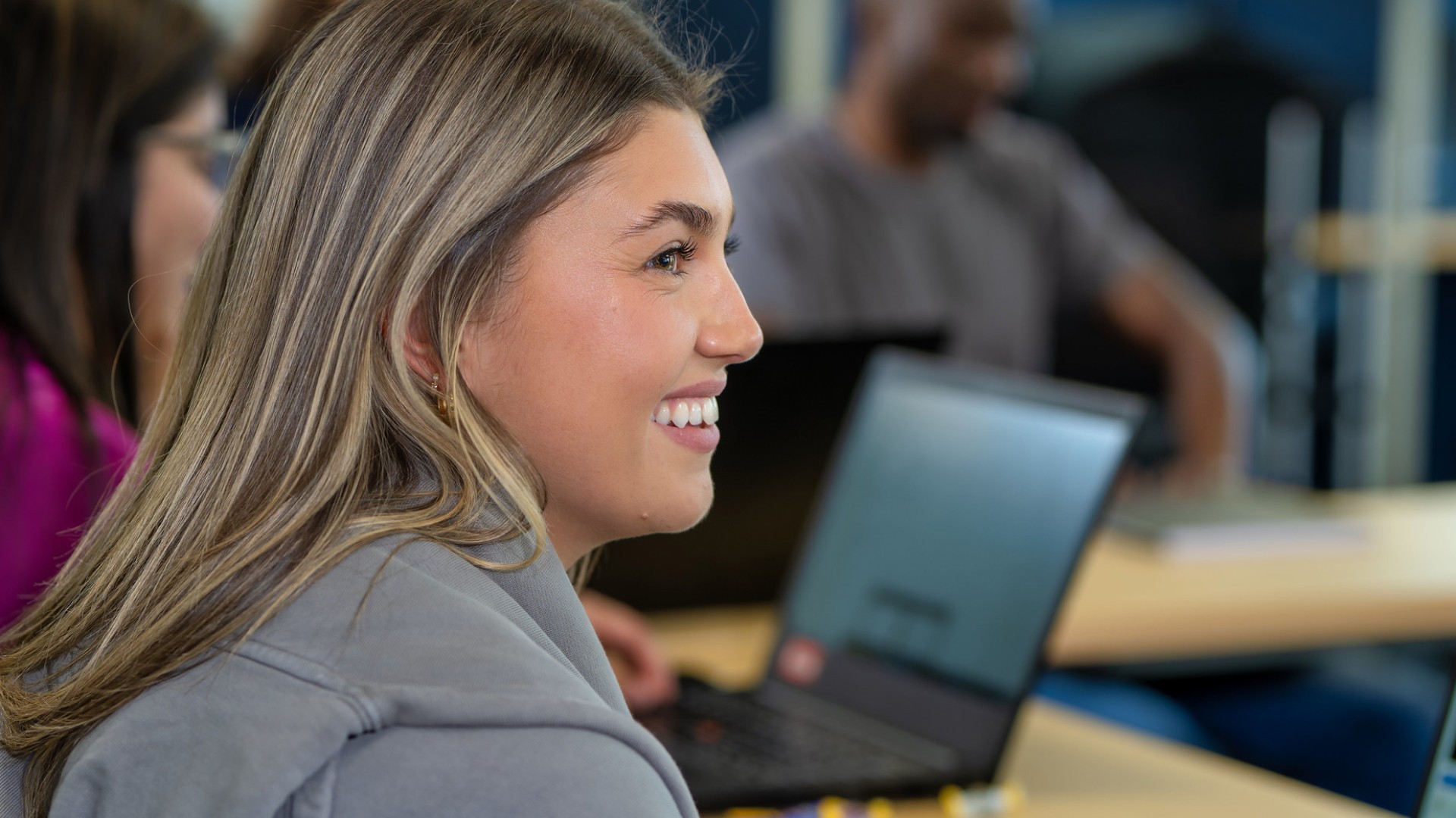 Smiling in student in class