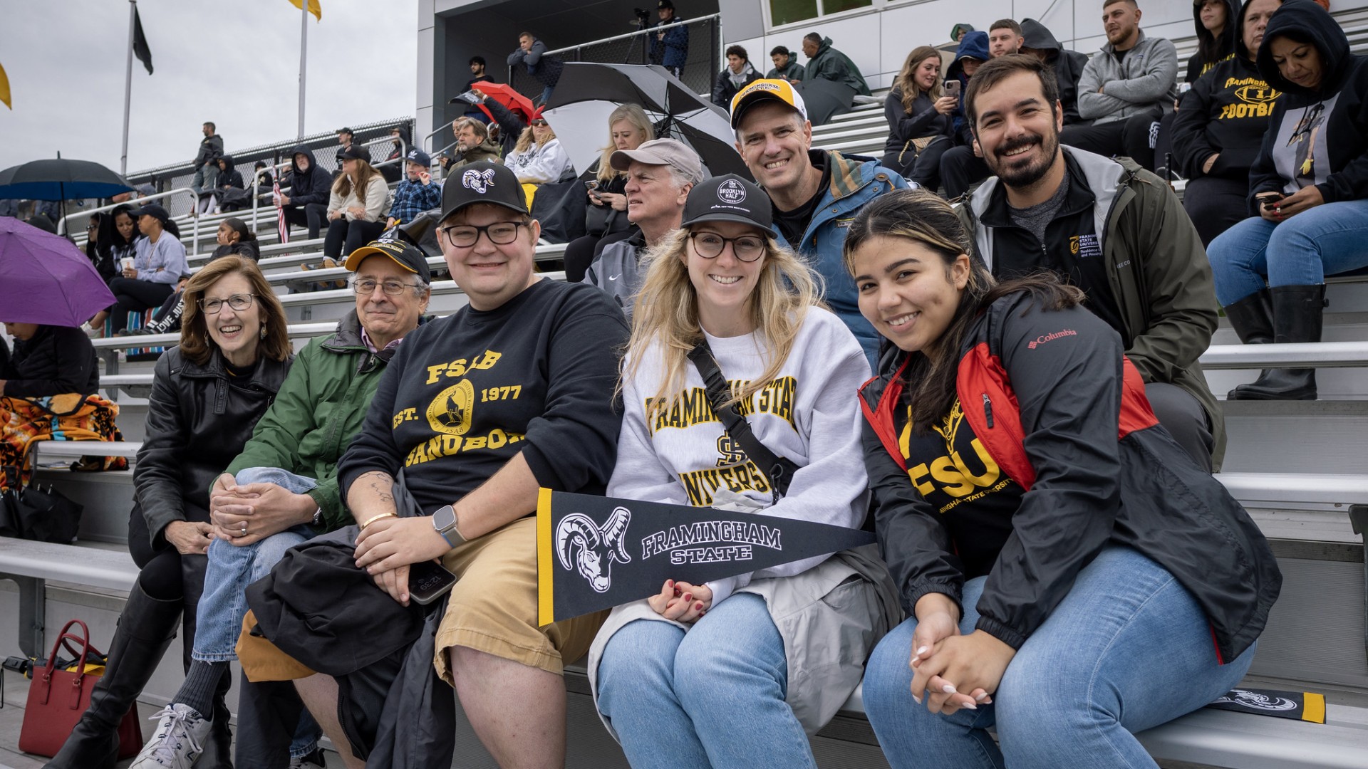 Picture of people sitting on bleachers