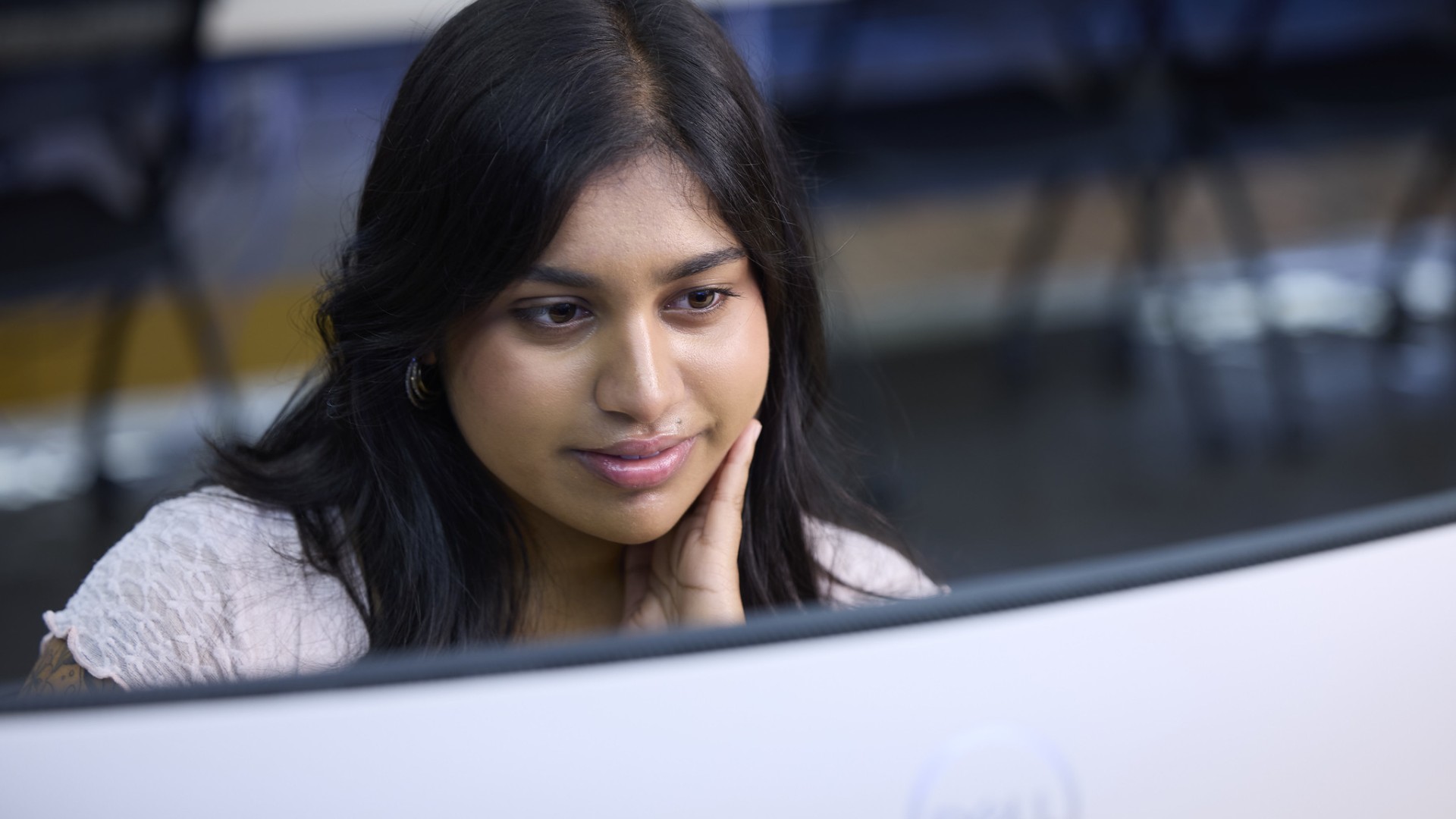 A student looking at a computer screen