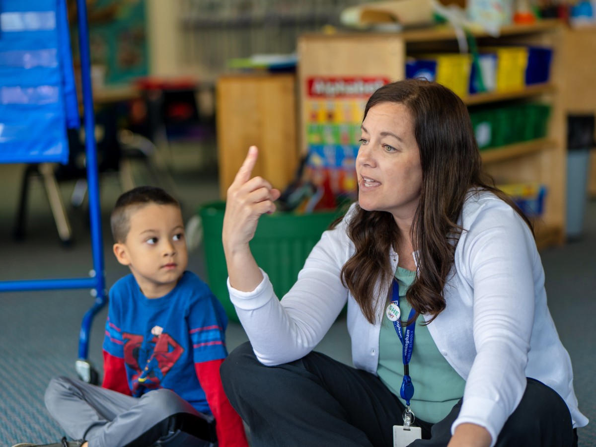 Cara Chase with a student