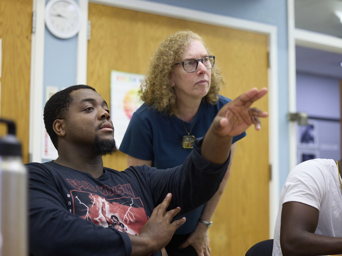 Teacher and student in classroom