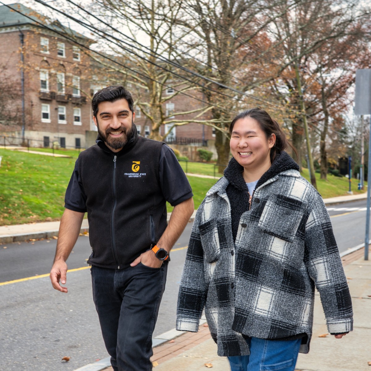 Two students walking down State Street