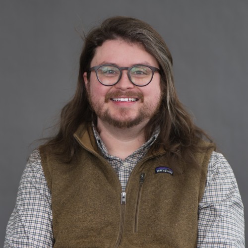 Smiling picture of Christopher Daly